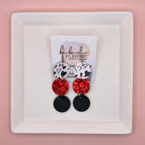 DAISY -  Leather Earrings  ||   <BR> BLACK SCRIBBLED HEARTS,<BR>METALLIC RED LEOPARD, <BR> MATTE BLACK