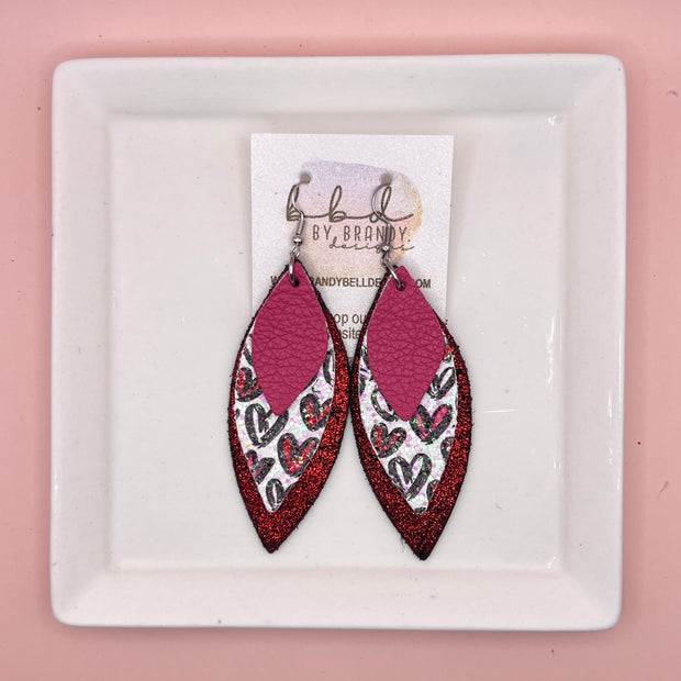 DOROTHY -  Leather Earrings  ||   <BR> MATTE PINK, <BR> GLITTER HEARTS ON WHITE (FAUX LEATHER), <BR> SHIMMER RED ON BLACK